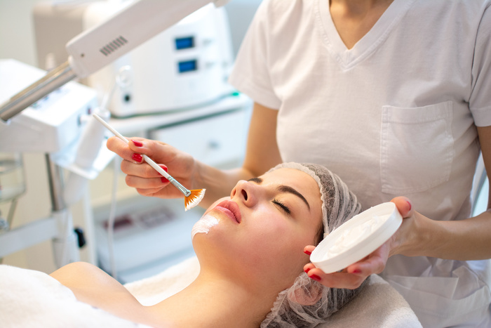 women at med spa taking beauty treatment